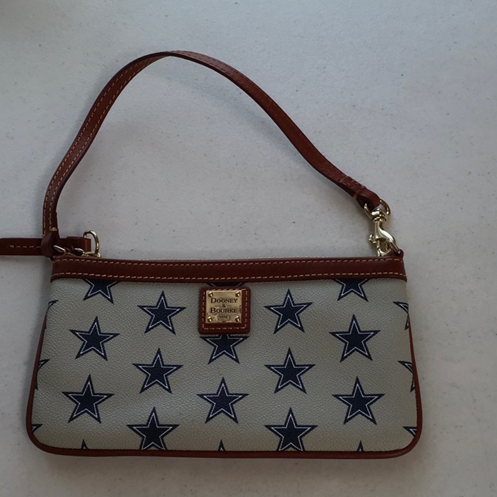 Dooney & Bourke Brown and Cream Clutch with Star Pattern- New. Never used
